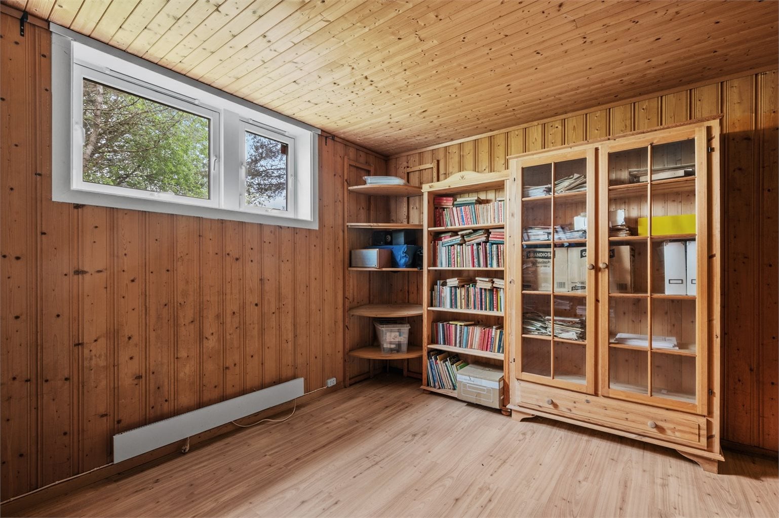 Romslig kjellerstue på 11,5 m².